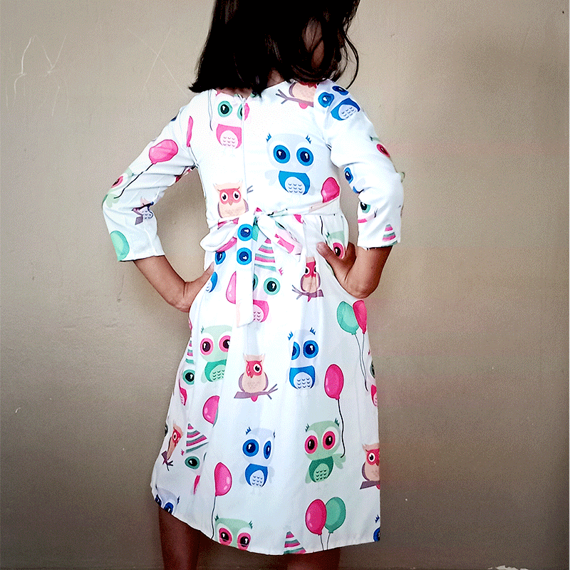 Robe petite fille manche longue blanche à motif