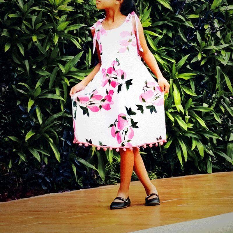 Robe petite fille à pompon rose (5-6 yrs)